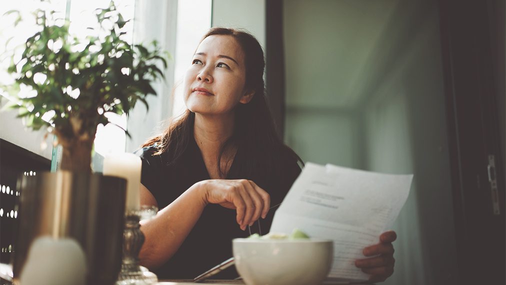 Serene woman thinking